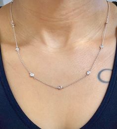 "Trendy Diamond By The Yard Necklace made of 925 sterling silver with a high polish 14K white gold or rose gold finish. It features high quality bezel set cubic zirconia stones every 1.5\" throughout. White gold- 18\" adjustable to 16\" & 17\" Rose Gold- 18\" ONLY How to care for your gold plated sterling silver jewelry: To clean your gold plated jewelry, use a soft cotton ball or a very soft cloth to remove any dust or dirt. This will clean and restore shine to your piece. Once you clean it Necklace Silver Diamond, Diamond By The Yard, Silver Diamond Necklace, Bezel Necklace, Solitaire Necklace, Necklace Stone, Diamond Solitaire Necklace, Platinum Jewelry, Necklace Diamond