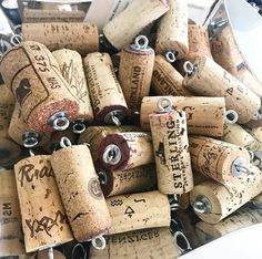 a bunch of wine corks that are stacked together