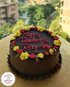 a chocolate cake sitting on top of a wooden table