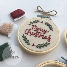 the embroidery kit is being used to make christmas decorations