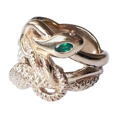 Emerald White Diamond Snake Ring Victorian Style Ruby J DAUPHIN "Eternal Renewal" made in bronze inspired by the Victorian age Hand made in Los Angeles The serpent, or snake, is one of the oldest and most widespread mythological symbols. Historically, serpents and snakes represent fertility or a creative life force. As snakes shed their skin through sloughing, they are symbols of rebirth, transformation, immortality, and healing. The ouroboros, the snake forever swallowing its own tail, is a famous alchemical symbol of transformation. Jung saw the ouroboros much like he saw the mandala, as an archetypal template of the psyche symbolizing eternity and the law of endless return. For Jung the snake of huge importance was significant symbol for the genetic matrix from where all vertebrate life Snake Ring Gold, Victorian Age, Gold Flower Ring, Head Ring, Snake Jewelry, Diamond Eyes, Gold Cocktail Ring, Ringe Gold, Heart Shaped Rings