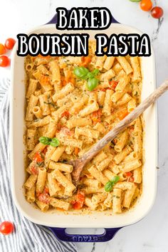 baked boursin pasta in a casserole dish with a wooden spoon