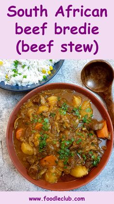 a bowl filled with beef stew next to rice