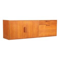 a large wooden cabinet with two drawers on one side and an open drawer on the other