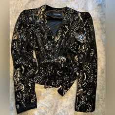 Amanda Uprichard Black Velvet Jacket Blazer With Black & Gold Sequins Nwot. Belt Loops With Belt Noted. Sequins Are In A Paisley Floral Like Design. Sequins Are Black, Gold And Grey. Material Is Velvet. Puffed Shoulders Noted. No Issues Noted. Refer To Pics And Ask All Questions. Make Me An Offer! Designer Blazer For Night Out In Fall, Designer Long Sleeve Blazer For Night Out, Designer Winter Blazer For Night Out, Designer Blazer For Night Out In Winter, Designer Party Outerwear For Fall, Designer Winter Outerwear For Night Out, Designer Black Outerwear For Night Out, Designer Black Long Sleeve Blazer, Black Velvet Jacket