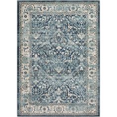 a blue and white rug with an ornate design