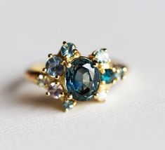 Teal Sapphire Cluster Ring, Gold Cluster Ring – Capucinne Green Engagement Ring, Etsy Engagement Rings Unique, Green Engagement Rings, Sapphire Cluster Ring, Oval Sapphire Engagement Ring, Engagement Ring Blue, Blue Engagement Ring, Oval Engagement Ring, Teal Sapphire