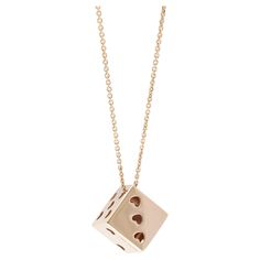 This unique 18K rose gold pendant necklace, designed and made in Italy, is in the form of a dice cube. It is very trandy and stylish, can be matched with jeans and everyday wear. The company was founded one and a half centuries ago in Macau. The brand is renowned for its high jewellery collections with fabulous designs. Our designs reflect the cultural and aesthetic value of its origin – Macau, where East meets West, with the inspiration from the beauty of oriental and Roman art. The finest hand Dice Necklace, Cube Pendant, Rose Gold Pendant Necklace, High Jewellery, East Meets West, Roman Art, Rose Gold Pendant, Jewelry Lookbook, Exquisite Jewelry