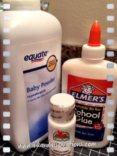 bottles of baby powder, and an infant formula are on the counter