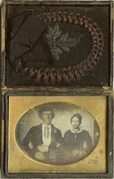 an old photo of two women in front of a leaf on the back of a box