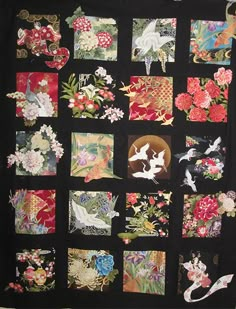 a black quilt with many different designs on it