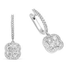 Wow her with the dazzling look of these feminine-style diamond drop earrings. Crafted in 14K white gold, this clover-shaped design features a diamond embellished post leading to a diamond pave clover frame. Inside, four diamonds glisten in unique invisible pave settings that move with every beat of her heart and every turn of her head. These sure-to-be-treasured earrings secure comfortably with a English lock backs. 1.26 carat white diamonds  14K white gold  The earring& Elegant Vvs Clarity Diamond Dangle Earrings, Elegant White Diamond Earrings With Pave Setting, Luxury Diamond Dangle Earrings With Pave Setting, Luxury Diamond-shaped Diamond Earrings, Clover Flower, Buying Diamonds