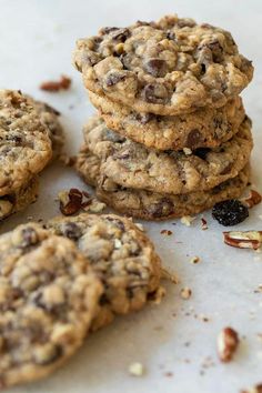 chocolate chip cookies are piled on top of each other