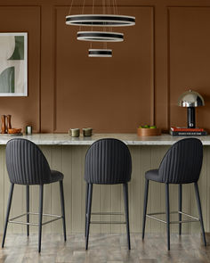 Meet the Saylor black faux leather bar stool. Featuring a fluted curved back design, elegant stitching detail and upholstered legs, this bar stool will enhance your home bar or kitchen island. Created with families in mind, its wipe-clean and stain-resistant faux leather upholstery ensures effortless maintenance without sacrificing luxury. The Saylor bar stool is the perfect blend of style and practicality. Leather Bar Stools, Leather Bar, Curved Back, Extendable Dining Table