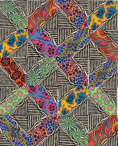 an abstract pattern with many different colors and patterns on it's sides, including the center