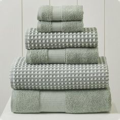 four towels stacked on top of each other