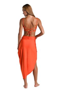 At once sexy and sophisticated, this pareo by Sunshine 79 is destined to become your go-to favorite of the season. Equally gorgeous paired with a one-piece suit as it is a bikini top and bottoms, this convertible sarong has a faux wrap design that creates gorgeous cascades of softly draping fabric. [split] Details Pareo cover-up Faux wrap design Lightweight fabric Fabric 83% Nylon, 17% Lycra Elastane Fitted One-piece Beach Season Cover-up, Fitted One-piece Beach Cover-up, Fitted Beachy Cover-up For Party, Party Beachwear With Tie-side Bottom, Fitted Beachy Party Cover-up, Chic Resort Season Beach Cover-up Swimwear, Backless Beachwear Cover-up For Poolside, Backless Poolside Beachwear Cover-up, Party Beachwear Swimwear With Tie Back