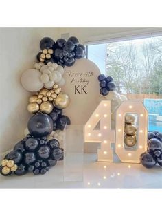 balloons are arranged in the shape of letters and numbers for an anniversary party or celebration