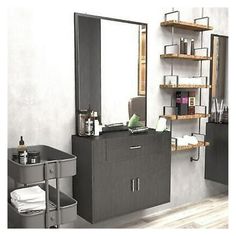 a large mirror sitting above a sink in a bathroom next to a shelf filled with items