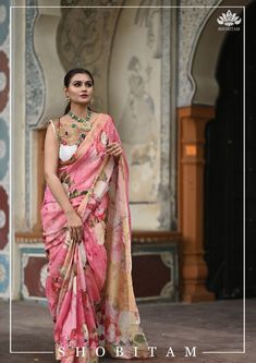 Does your wardrobe have a floral Saree yet? This saree in Crisp and comfy Linen by Linen is loaded with comfort and breathability. Ease of maintenance makes this even more attractive! It comes in a pleasing pink shade and has rose and other florals are rendered digitally! Muted zari borders highlight both edges. The saree is ready to wear with falls and pico done. Pretty designer tassels add charm. An unstitched blouse fabric is included. *Note: Color and shading may slightly vary due to lightin Designer Tassels, Floral Saree, Linen Saree, Pink Shade, Pink Linen, Printed Linen, Blouse Fabric, Pure Linen, Sarees Online