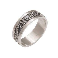 You'll be dotting your i's and crossing your t's in style with this elegant band ring from Komang Wijayana in Bali. The ring is crafted from sterling silver with an oxidized center panel providing a dramatic backdrop for bun (wirework) and jawan (silver granules) motifs. Sterling Silver Jewelry With Decorative Wide Band, Sterling Silver Wide Band With Decorative Design, Classic Adjustable Decorative Bands, Adjustable Anniversary Ring With Decorative Band, Adjustable Band Promise Ring, Silver Adjustable Round Band, Adjustable Jewelry With Decorative Band, Adjustable Silver Round Band, Silver Jewelry With Decorative Band