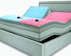 a bed with two different colored mattresses on top of each other and one is closed