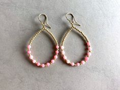 HOOP EARRINGS PINK; IN GOLD; ROSEGOLD OR SILVER Summer Hoops, Boho Style with pink colored Mother of pearl beads. If you are interested in these earrings with other stones, you are welcome to contact me. I have a lot more Colors and stones that I can make them with. I package my jewelry in a pretty cotton pouch for sending. MATERIAL Gold filled, Rose Gold filled or Silver  Mother of pearls, dyed Pink Hoop Earrings, Mother Of Pearl Rose, Rosé Gold, Rosa Gold, Cotton Pouch, Pearl Rose, Earrings In Gold, Earrings Pink, Pink Summer