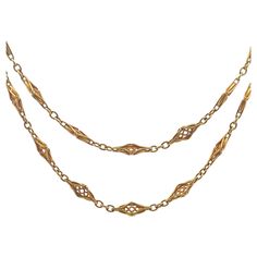 This elegant French Art Nouveau Fancy Chain Link Necklace measures 34 inches in length and is crafted in 18 karat yellow gold. Featuring beautiful intricate and ornate chain links that reflect the organic and flowing forms characteristic of the Art Nouveau movement. The fluidity of the design make this necklace a timeless piece, perfect for adding to a nice necklace stack as a double layer or one long single strand. Art Nouveau necklace, 18 karat gold, French jewelry, vintage chain link necklace Strand Art, Green Gemstone Bracelet, Art Nouveau Necklaces, Art Nouveau Ring, Necklace Stack, French Art Nouveau, Amethyst And Diamond Ring, Yellow Gold Bangle, French Jewelry