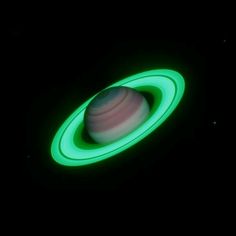 an image of a green and white object in the dark sky with glow on it