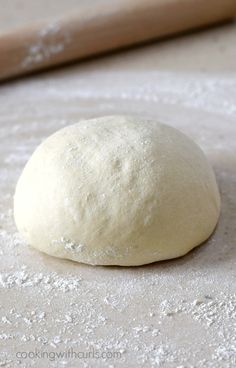 a ball of dough sitting on top of a table