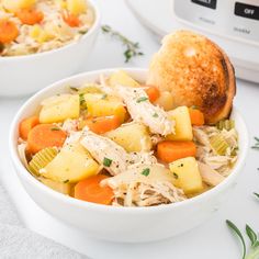 two bowls filled with chicken, potatoes and carrots next to an instant pot roast