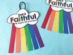 two rainbow colored paper tags with the words god is faithful and god is beautiful on them