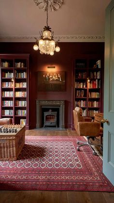 a living room filled with furniture and a fire place in the middle of a room