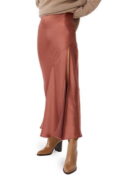 An asymmetric seam trails down the front of this lustrous satin skirt cut to a floor-grazing length. 38 1/2" center front length (size Medium) Unlined 53% viscose, 47% rayon Dry clean Imported Terracotta Skirt, Sew Ideas, Olive Top, Satin Maxi Skirt, Maxi Skirt Outfits, Satin Maxi, Satin Skirt, Silk Skirt, Skirt Outfits