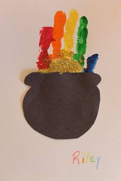 this is an image of a st patrick's day craft with rainbows in a pot