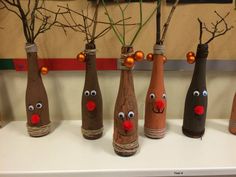 the bottles have been decorated to look like reindeers with noses and noses on them