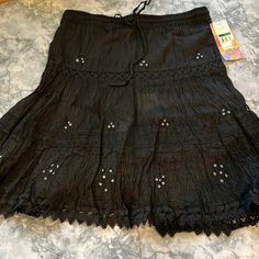 Woman’s Size Large Black Skirt. Nwt Nice Gauze Like Cotton Material With Sequence And Lace Bottom Trim. Skirt Has A Short Lining. Very Pretty. Black Short Skirt For Vacation, Black Mini Skirt For Vacation, Black Cotton Beach Skirt, Beach Black Cotton Skirt, Fairycore Skirts, Lime Green Skirt, Grunge Skirt, Denim Skirts Knee Length, Trim Skirt