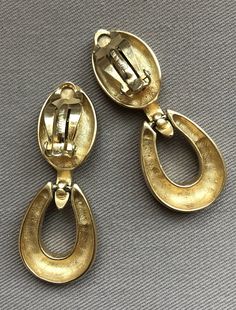 CHIC Signed ERWIN PEARL French Matte Gold Drop Clip On Statement Earrings c. 1980s -Classy and timeless these earrings feature a French matte gold finish -Clip ons -Signed Erwin Pearl -Excellent vintage condition with age appropriate wear Triple Ring, Black Tissue Paper, Deco Chic, Cardboard Jewelry Boxes, Gold Statement Earrings, Gold Clips, San Antonio Tx, Earrings Photo, Blue Earrings