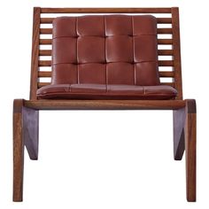 a wooden chair with brown leather upholstered on it's back and legs