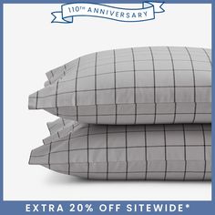 two pillows are stacked on top of each other with the words extra 20 % off site