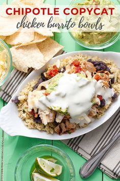 a bowl filled with chicken burrito bowls next to tortilla chips and guacamole