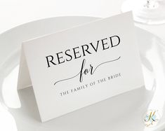 reserved for the family of the bride card on a plate