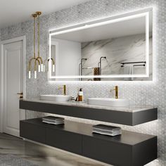 a bathroom with two sinks and a large mirror