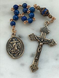 This Beautiful pocket rosary is made from 6 and 8mm gemstones. The wire is strong 20 gauge solid bronze and the Purgatory medal and pardon crucifix are bronze. The Rosary is the most excellent form of prayer and the most efficacious means of attaining eternal life. It is the remedy for all our evils, the root of all our blessings. There is no more excellent way of praying.~Pope Leo XIII Bronze Rosary With Round Beads As Gift, Bronze Rosary As Gift, Berries Photography, Pope Leo Xiii, Rosary Beads Necklace, Pope Leo, Custom Rosary, Rosary Bracelet, Rosary Catholic