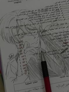 a pen and some writing on top of a piece of paper with an anime character