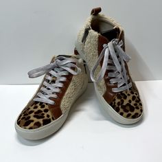 Brand New / No Box No Flaws Vince Camuto High-Top Sneakers Size 6 Fits True To Size Please See Pictures For Details! Leopard Print Genuine Cow Hair Brown And Black Genuine Leather Trims Fleece Lining And Heel Area Rubber Sole Printed Laces Zipper Reasonable Offers Welcome Smoke Free Home Next Day Shipping Cream Lace-up Sneakers For Fall, Custom Cream Leather Sneakers With Laces, Cream Lace-up Sneakers With Speckled Midsole, Cream High-top Sneakers With Speckled Midsole, Cream Custom Sneakers With Contrast Sole, Beige Custom Sneakers With Round Toe And Laces, Custom Cream Sneakers With Contrast Sole, Mid-top Cream Leather Custom Sneakers, Custom Cream Sneakers With Contrast Sole And Round Toe