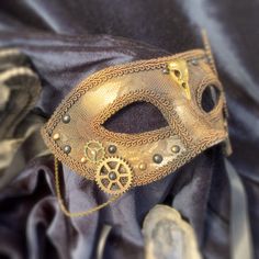 LADY ENGINE Steampunk, mask, cosplay, halloween, mask, carnival, masquerade, burning man, accessory, cosplay mask, steampunk masks, venetian UNIQUE MASK, HANDMADE AND SIGNED. Unique piece in paper mache, vegan leather, Swarovski stones and jewelry and wood gears. Handmade, designed for a steampunk event, a period costume or even decorating a space as a unique work. Adaptable and flexible, it has two perfect satin ribbons to hold it. The back surface is lined with felt scraps to offer comfort dur Wood Gears, Steampunk Masks, Masks Venetian, Felt Scraps, Mask Steampunk, Carnival Masquerade, Mask Carnival, Steampunk Mask, Unique Masks