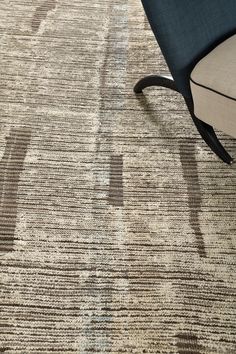 a chair sitting on top of a carpet covered floor