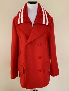 Givenchy Coat 100% Authentic Condition: New with Tags Size: Italian 44, US 8 The coat is a classic double breasted pea coat in red wool blend. It has button closures and pockets. It has a removable red and white striped thick knit collar to give two looks in one! As seen on Demi Lovato! Retail $2395. Coat measures approximately lying flat: bust-21", waist-21", sleeve length from shoulder seam to end-26", and length from the top of the shoulder to the hem-31" Comes from a smoke and pet Designer Long Sleeve Pea Coat With Button Closure, Designer Wool Pea Coat, Designer Winter Blazer With Double-breasted Button, Designer Double-breasted Blazer For Winter, Luxury Red Double-breasted Outerwear, Designer Long Sleeve Pea Coat For Winter, Designer Winter Double-breasted Blazer, Formal Red Wool Coat, Red Notch Lapel Outerwear With Buttons