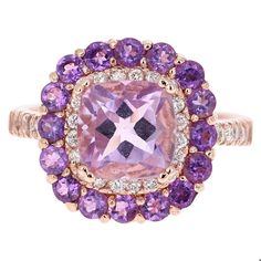 Amethyst and Diamond Cocktail Ring!  Playful yet Powerful! Its like having a piece of glittery candy on your finger! This ring has a light purple Cushion Cut Amethyst that weighs 2.29 Carats and is embellished with 16 Amethysts that weigh 0.87 Carats as well as 32 Round Cut Diamonds that weigh 0.40 Carats. The total carat weight of the ring is 3.56 Carats.  The Amethyst has a gorgeous light purple hue and measures at 8 mm x 8 mm.  The ring is crafted in `14 Karat Rose Gold and weighs approximate Rose Gold Cocktail, Purple Cushion, Purple Cushions, Gold Flower Ring, Amethyst And Diamond Ring, Vintage Jewelry Art, Purple Jewelry, Gold Cocktail Ring, Gold Cocktail